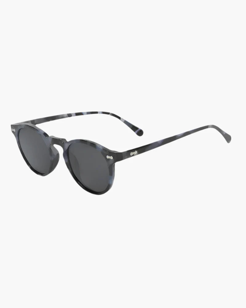 Gafas de sol redondas para hombre con protección UV400 y montura ligera de plástico