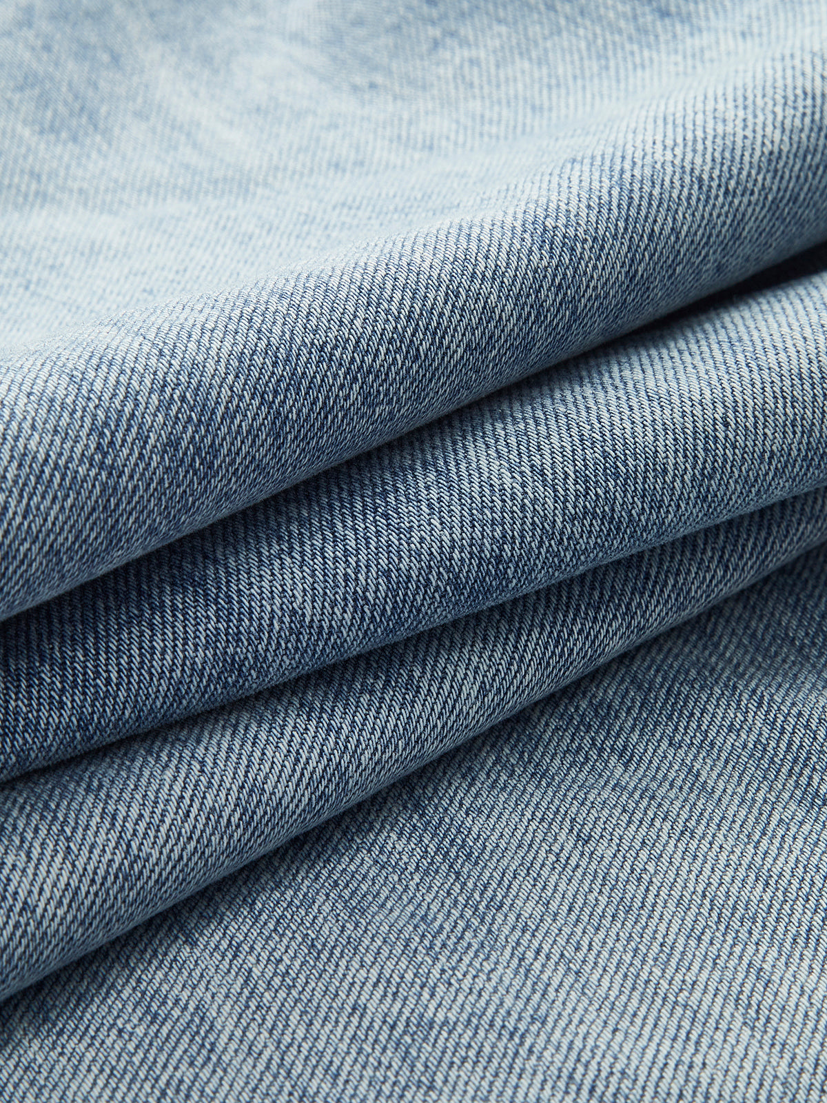 Denim broek lichtblauw detail textuur