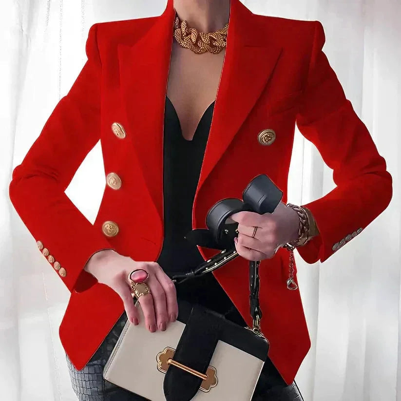 Blazer femme noir à double boutonnage, boutons dorés, coupe classique et silhouette élégante.