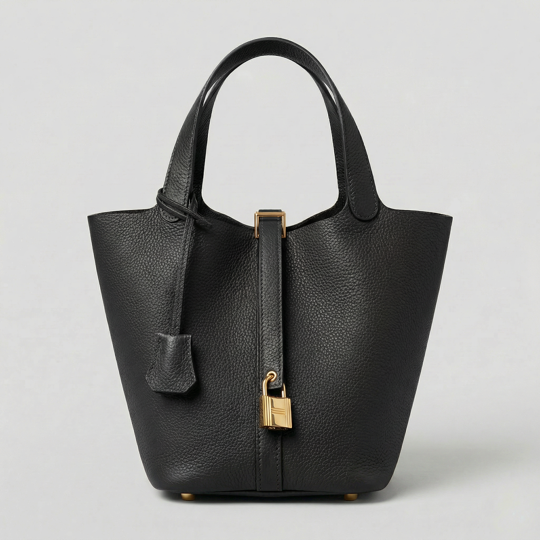 Læder tote taske til kvinder i mellemstørrelse med struktureret design