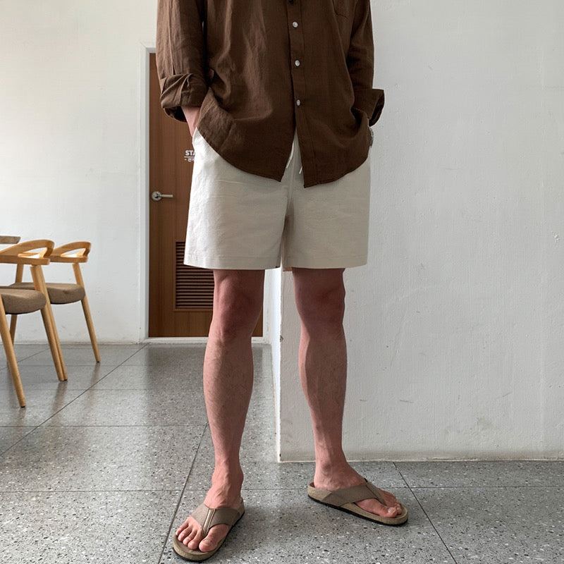 Elegantes pantalones cortos de verano para hombre slim fit en lino con bolsillos laterales