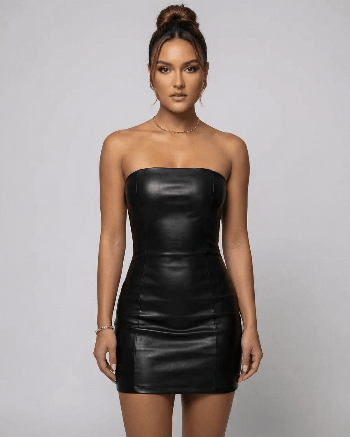 Lauven Monaco Mini Dress in black PU, strapless with sleek pencil silhouette, perfect for warm-weather styling.