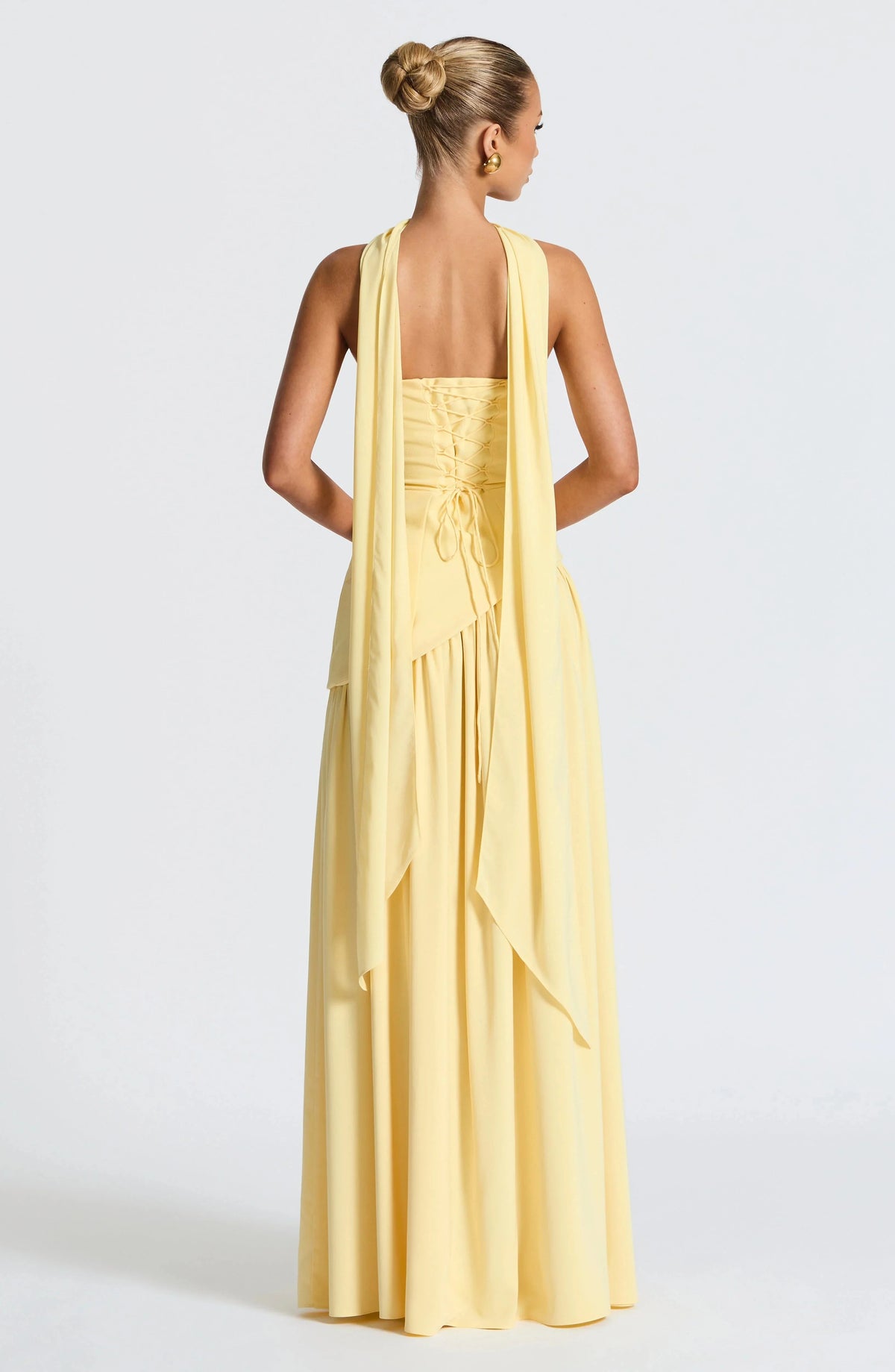 Robe longue femme en coton avec col ras-du-cou et fente sur le côté, idéale pour un look décontracté et élégant.