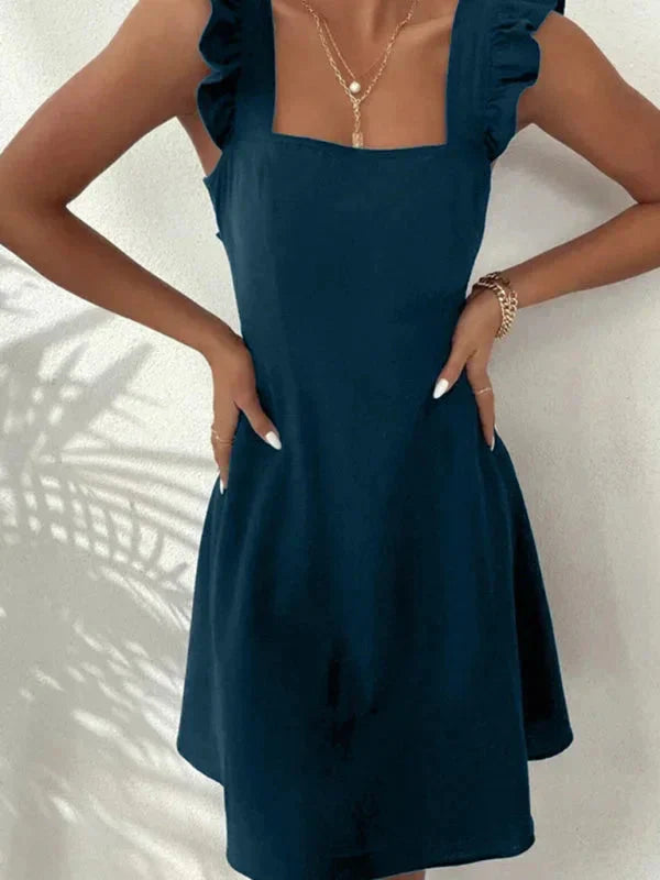 Robe courte évasée d'été avec volants, manches à bretelles, en tissu léger, disponible en plusieurs couleurs.