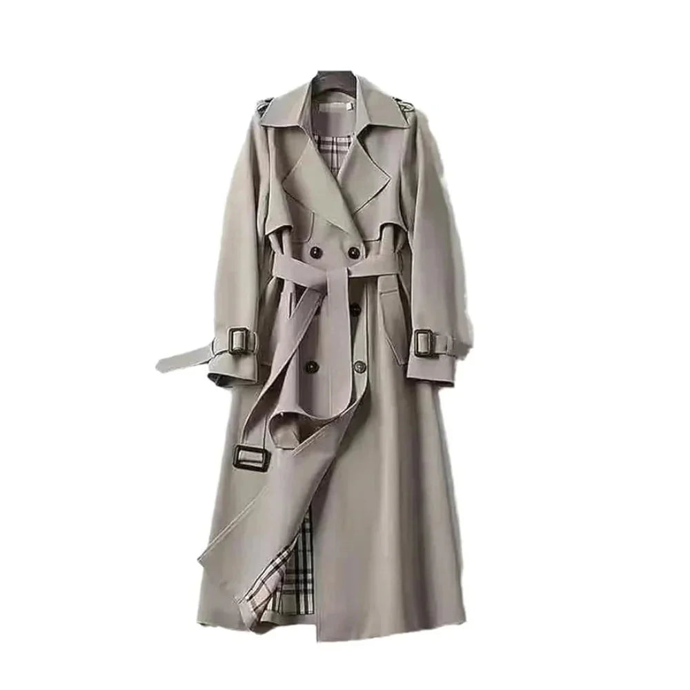 Trench-coat long noir pour femme, ceinturé, avec revers, en mélange de coton léger, adapté aux saisons intermédiaires.