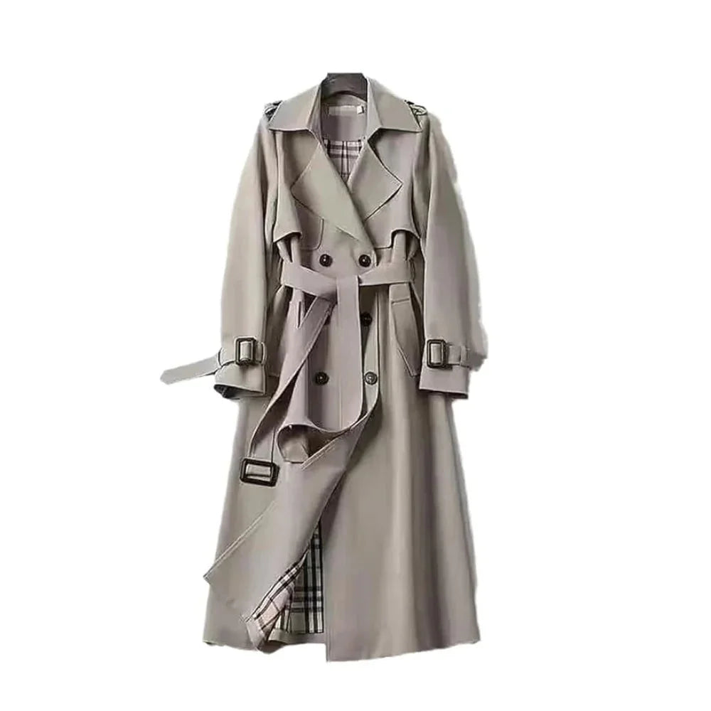 Trench-coat long noir pour femme, ceinturé, avec revers, en mélange de coton léger, adapté aux saisons intermédiaires.
