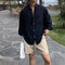 Elegantes pantalones cortos de verano oversize para hombre con bolsillos y cuello redondo