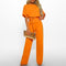 Kortærmet buksedragt til kvinder med bælte | Elegant jumpsuit med brede ben til hverdag og fest | Komfortabel løs pasform