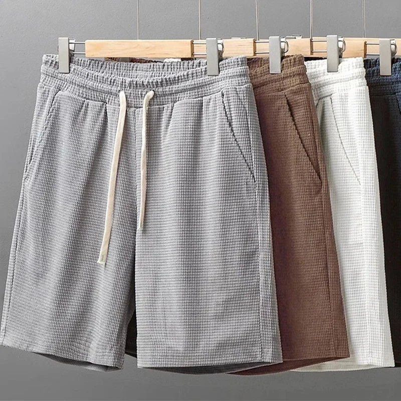 Cómodos pantalones cortos para hombre en tejido waffle con cintura elástica