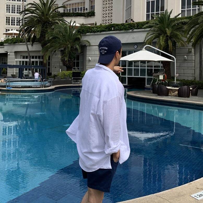 Elegantes pantalones cortos de verano oversize para hombre con bolsillos y cuello redondo