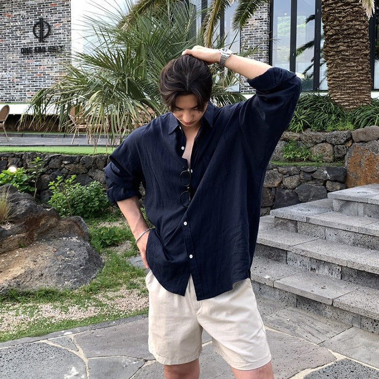 Elegantes pantalones cortos de verano oversize para hombre con bolsillos y cuello redondo