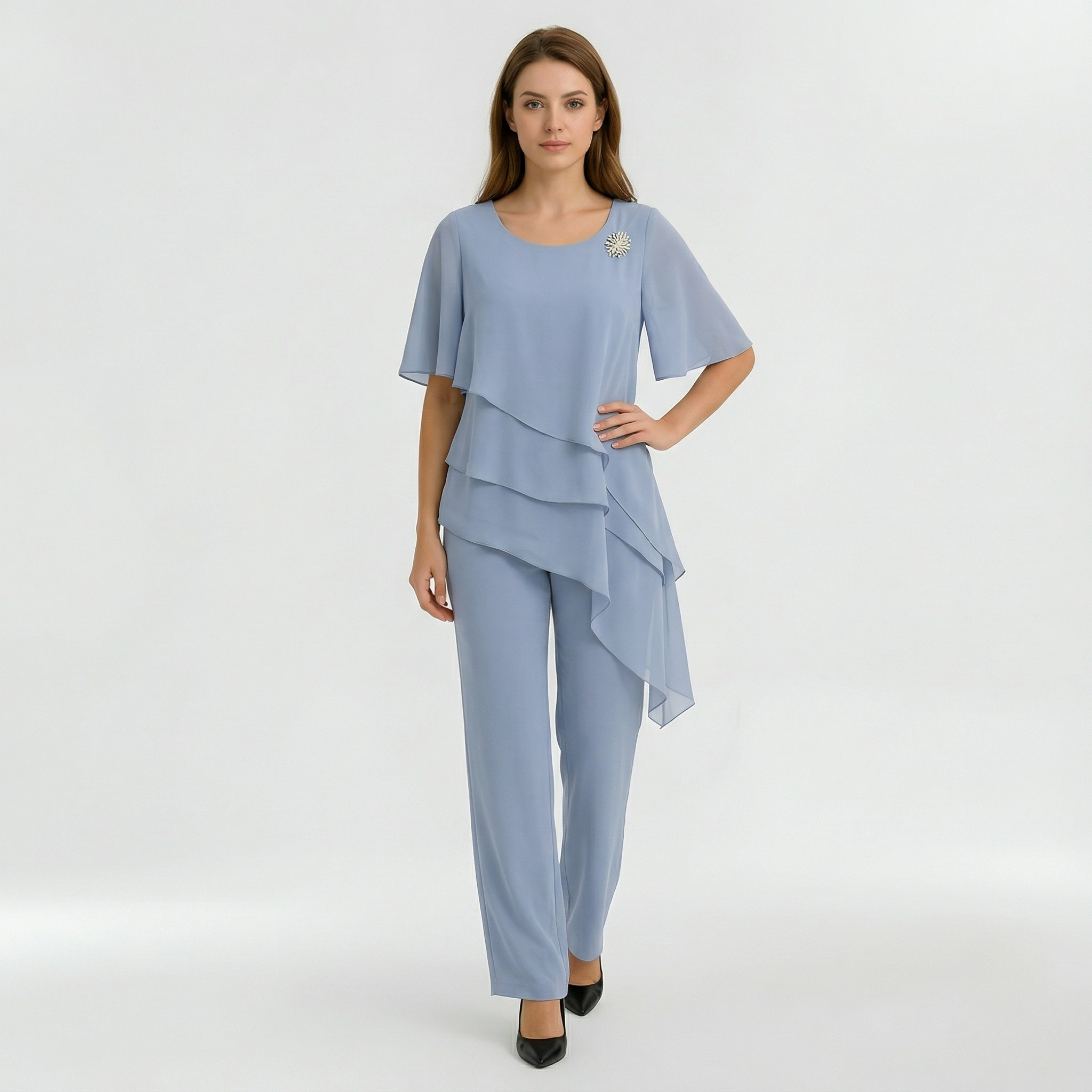Combinaison élégante pour femmes avec blouse à manches courtes et pantalons larges pour un look épuré