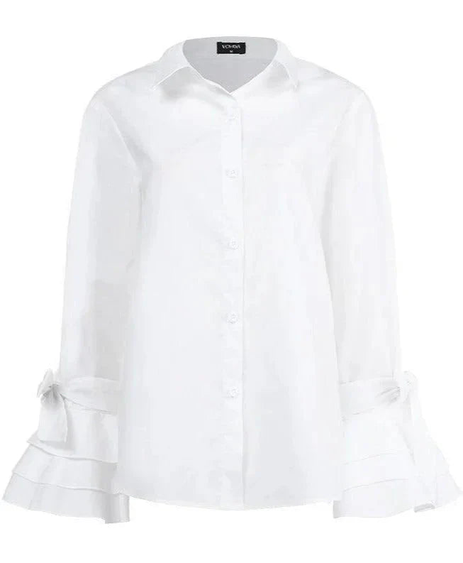 Blouse femme en coton léger, coupe élégante, manches volantées, motif léopard, idéale pour les occasions spéciales.