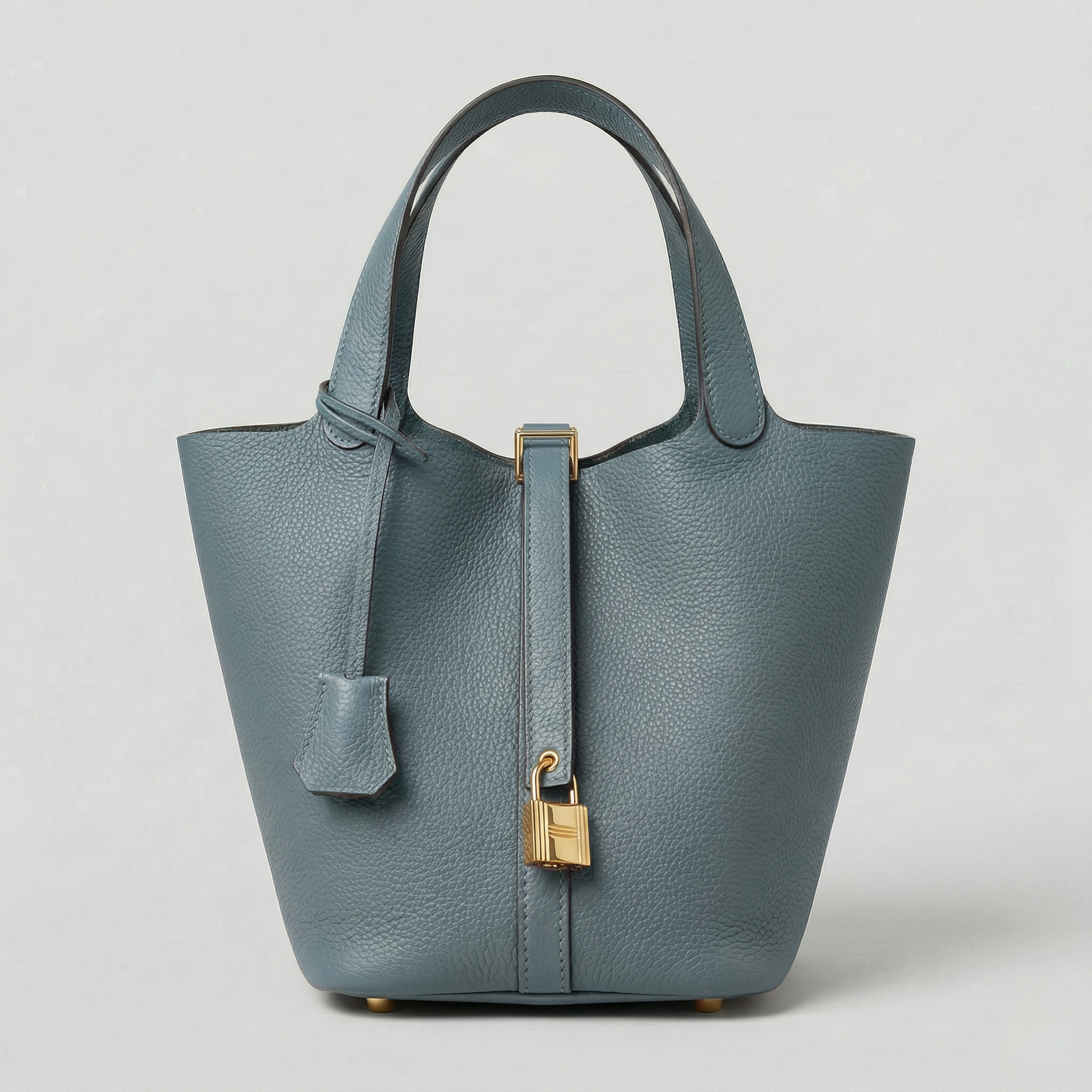 Læder tote taske til kvinder i mellemstørrelse med struktureret design