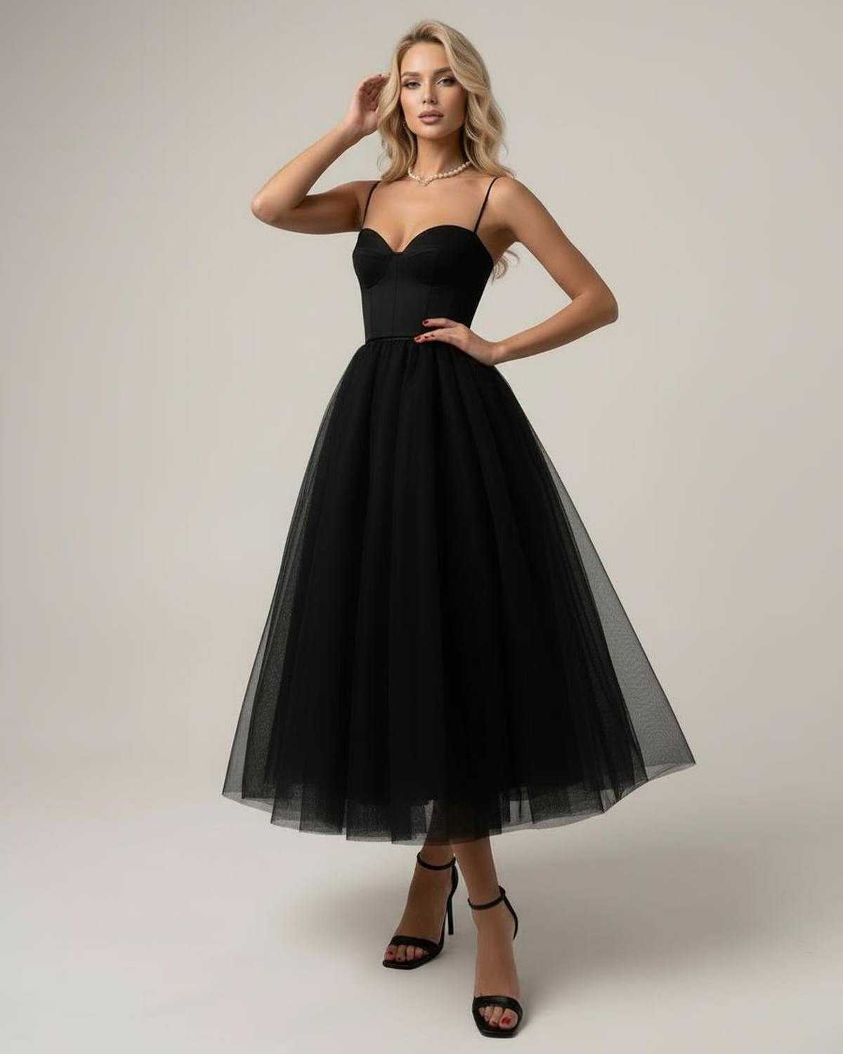 Noiré Midi Dress by Lauven – Elegant black strapless dress with tulle skirt and corset bodice.