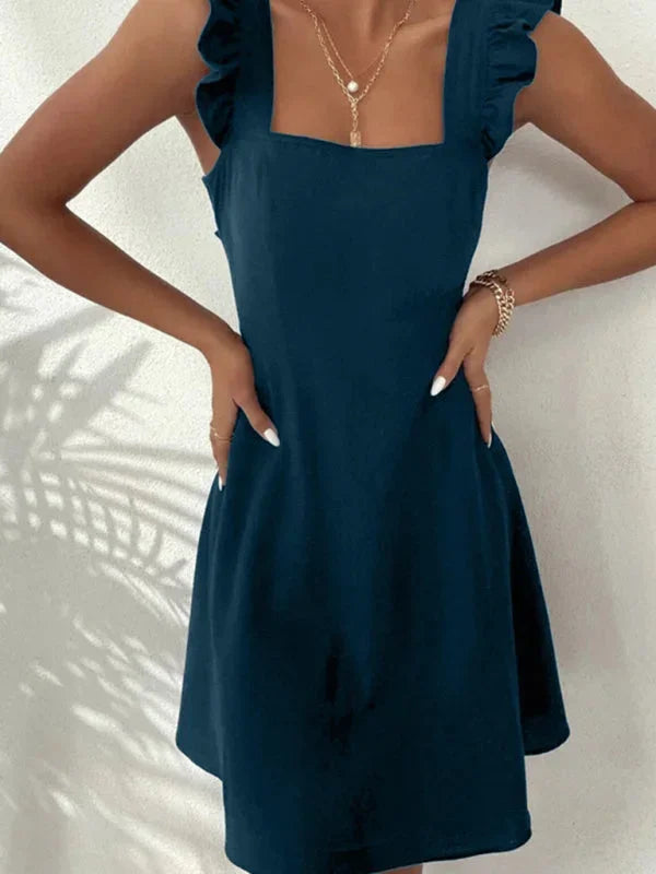 Robe courte évasée d'été avec volants, manches à bretelles, en tissu léger, disponible en plusieurs couleurs.