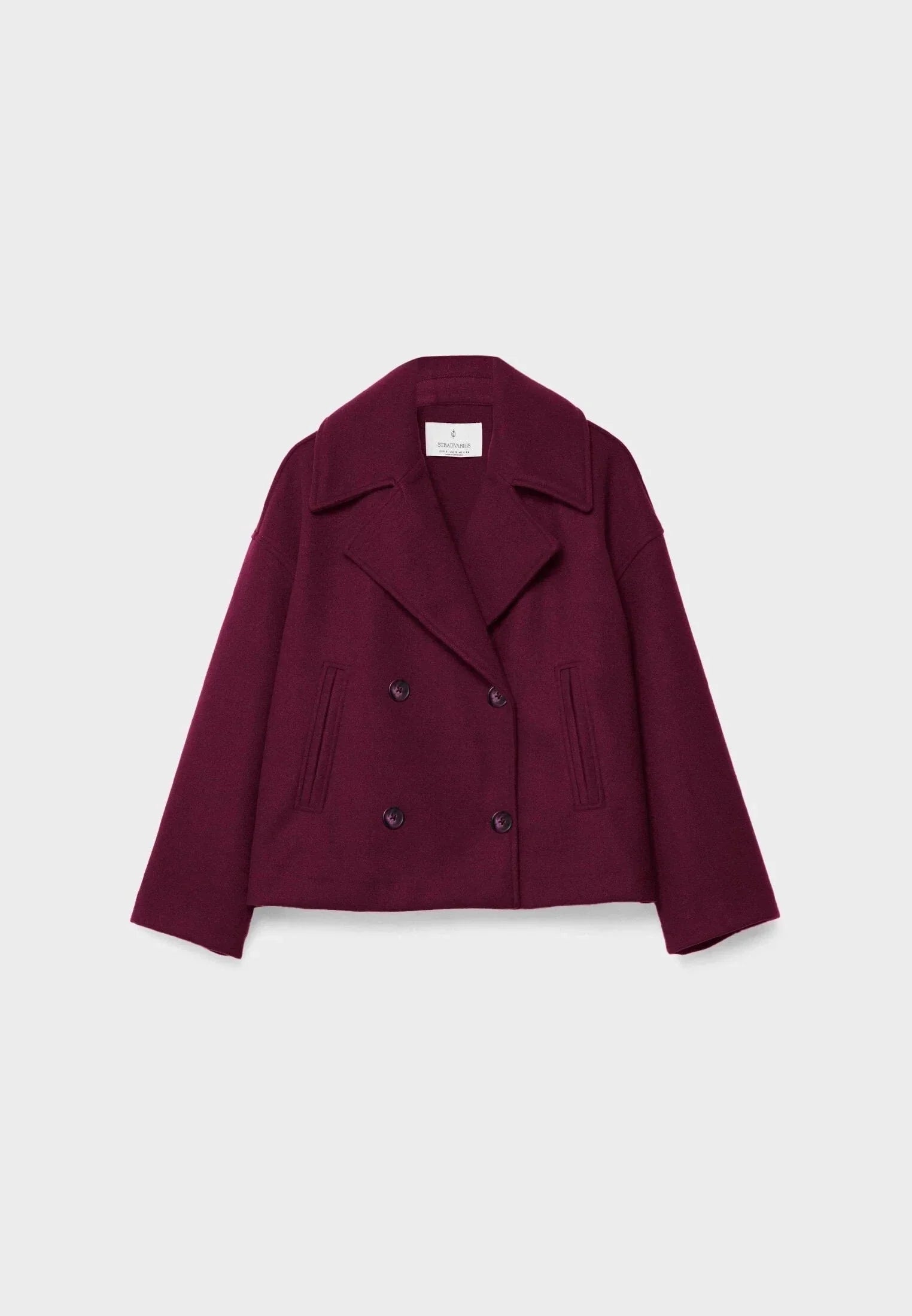 Veste femme courte beige à double boutonnage, en mélange de coton, pour des looks variés.